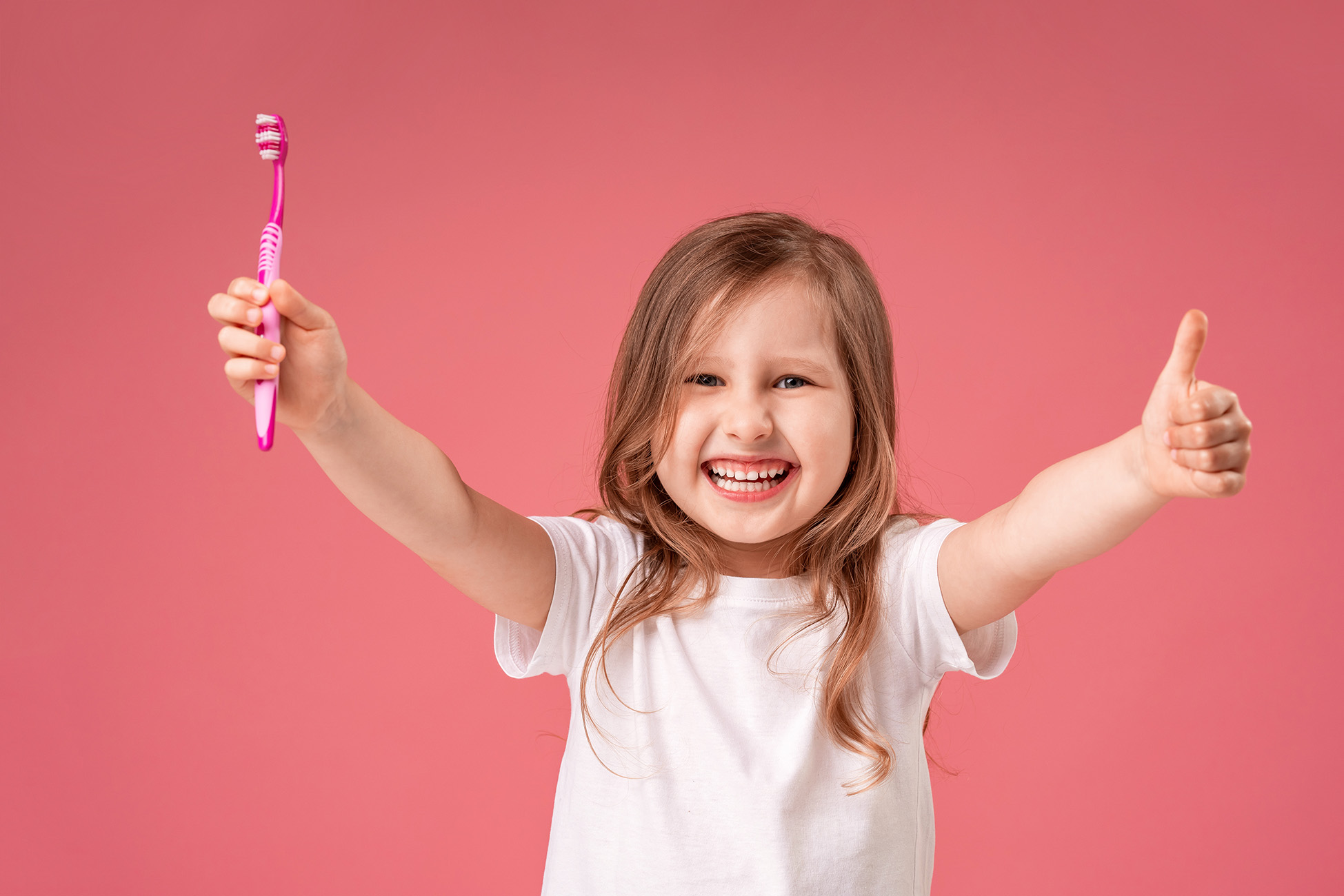 child with toothbrush Northfield Pediatric Dentistry in Denver, CO