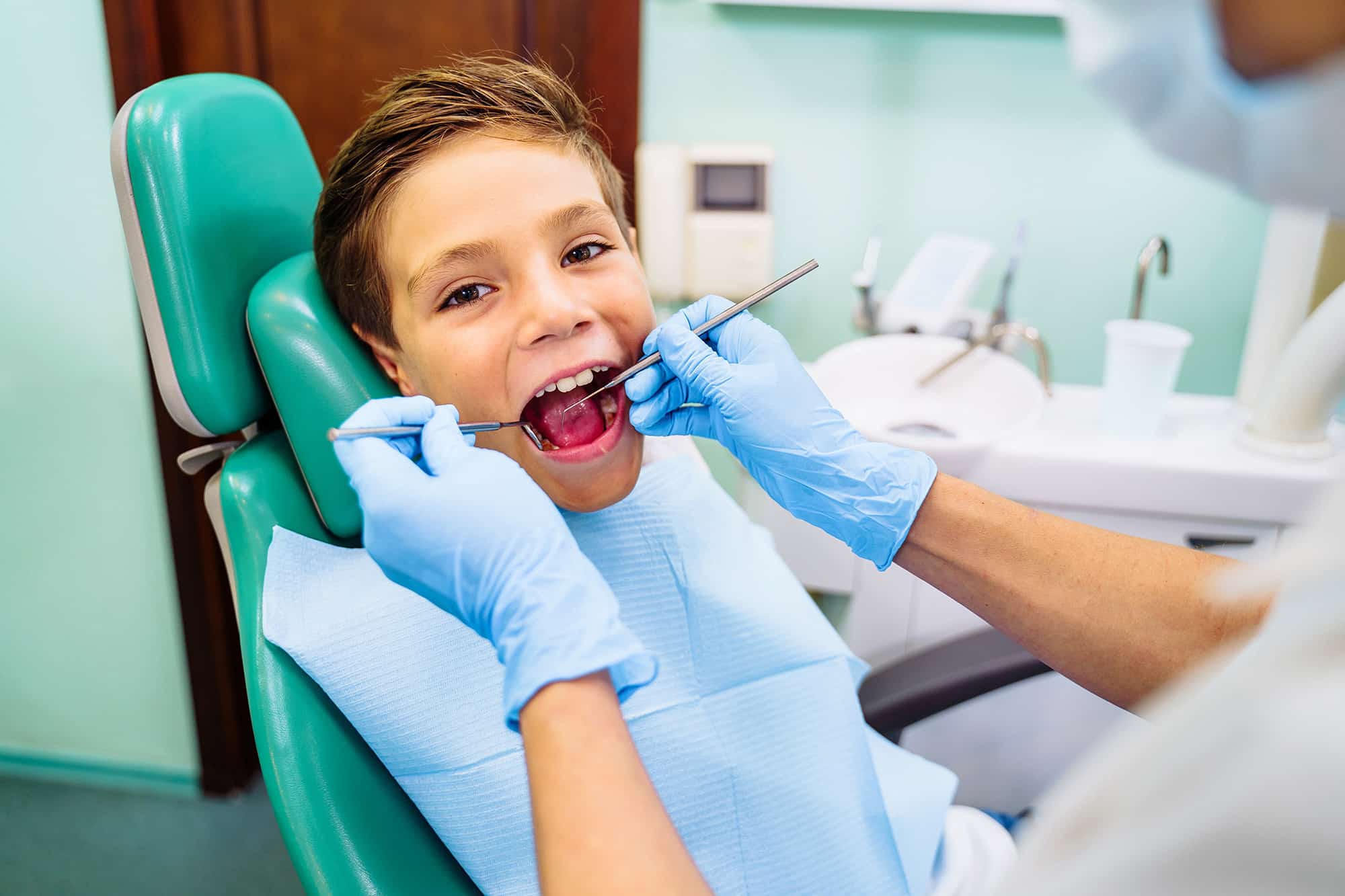 boy getting teeth cleaned in Denver, CO
